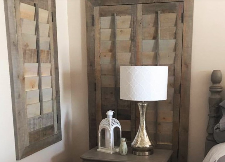 Philadelphia bedroom with repurposed wood shutters.